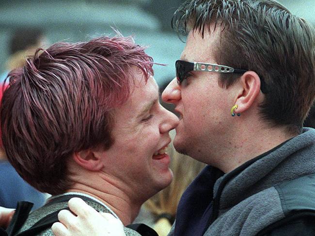 Gay couple hugging at SA homosexual gay rights protest demonstration 07 Jul 1999. /Homosexuality