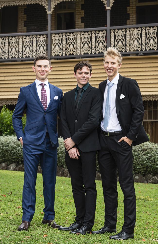 Graduates (from left) Thomas Pikramenos, Oliver Rutherfoord and Declan Campbell as Downlands College year 12 students come together for their valedictory mass at the college, Saturday, November 16, 2024. Picture: Kevin Farmer