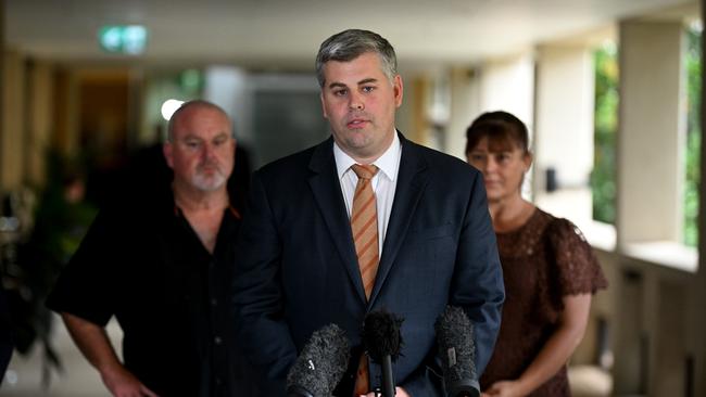 Queensland Police Minister Mark Ryan, flanked by the parents of Jack Beasley, Brett and Belinda Beasley. Picture: NCA NewsWire / Dan Peled