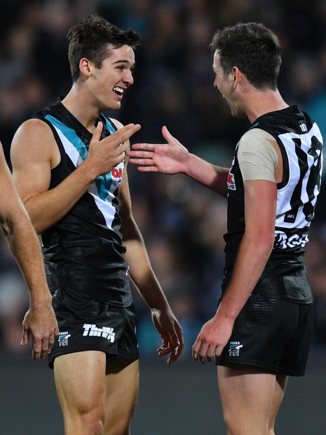 Connor Razee and Zak Butters celebrate a goal. Picture: AAP Image/David Mariuz