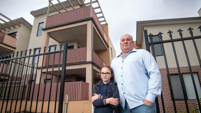 Craig Fitch and daughter Charli live in a building with flammable cladding. Picture: Jason Edwards