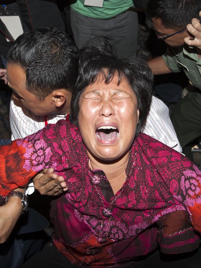 The loss of MH370 with 239 people on board left relatives around the world distraught. Picture: EPA