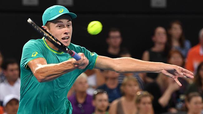 Alex De Minaur on his way to beating Milos Raonic on Wednesday night.