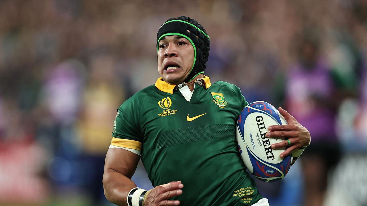 South Africa's wing Cheslin Kolbe runs in for a try.