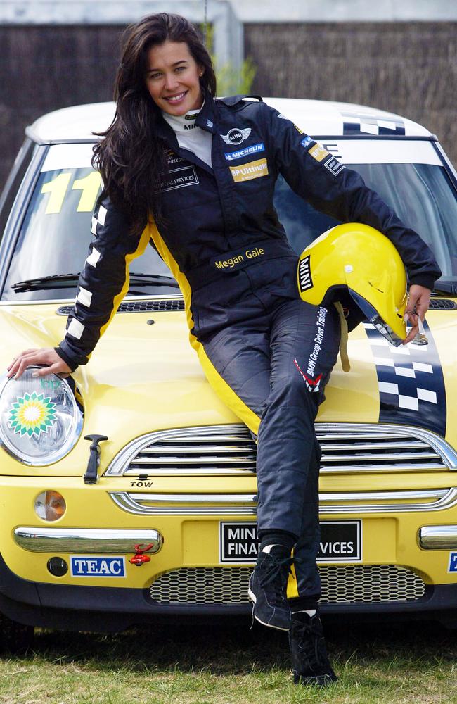 Model Megan Gale dons a matching helmet to her Mini for the celebrity challenge. Picture: Fiona Hamilton