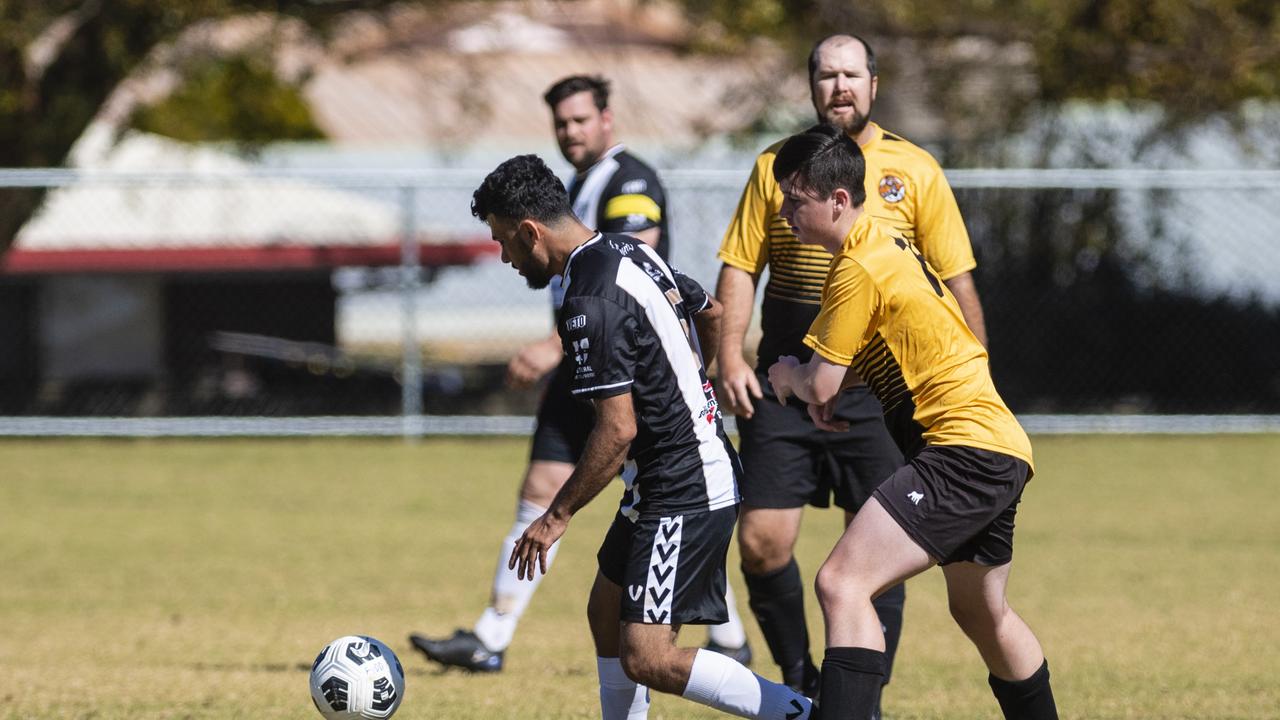 Atwan Khidher (left) of Willowburn against Riley Kimpton of Dalby Tigers in Div 2 Men FQ Darling Downs Presidents Cup football at West Wanderers, Sunday, July 24, 2022. Picture: Kevin Farmer