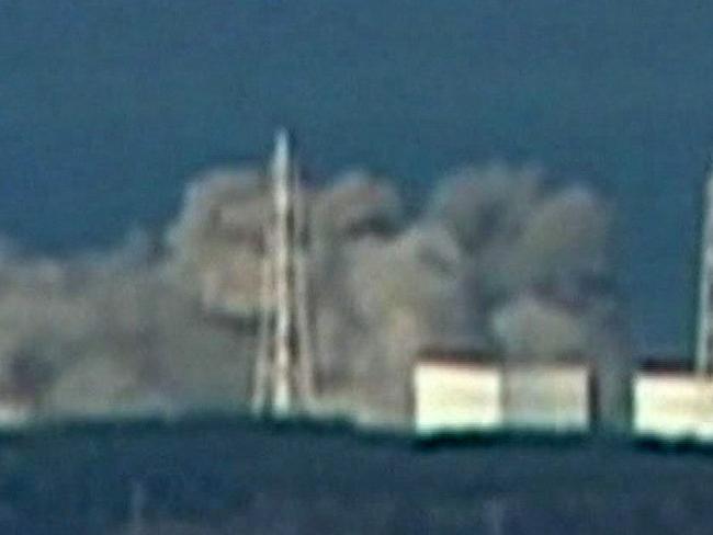 Smoke rises from Unit 1 of Fukushima Daiichi nuclear power plant in Okumamachi, Fukushima prefecture immediately after the meltdown. Picture: AP