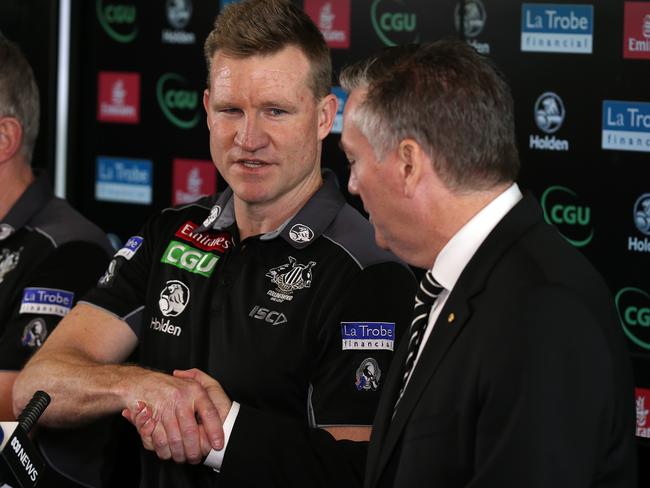 Nathan Buckley shakes hands with Eddie McGuire after getting a new contract. Picture: Michael Klein