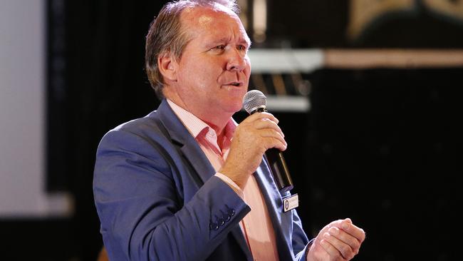 State Member for Ipswich West Jim Madden pictured at a political town hall meeting in 2018.