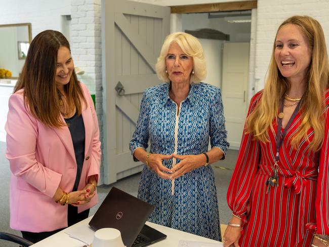 Queen Camilla is shown jewellery by founder Monica Vinader and a staff member during a visit to Monica Vinader’s design studio in Wells-Next-The-Sea. Picture: Getty Images