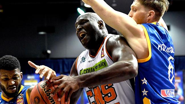 BRISBANE, AUSTRALIA — OCTOBER 13: Nathan Jawai of the Taipans takes on the defence during the round one NBL match between the Brisbane Bullets and the Cairns Taipans at Brisbane Convention &amp; Exhibition Centre on October 13, 2018 in Brisbane, Australia. (Photo by Bradley Kanaris/Getty Images)