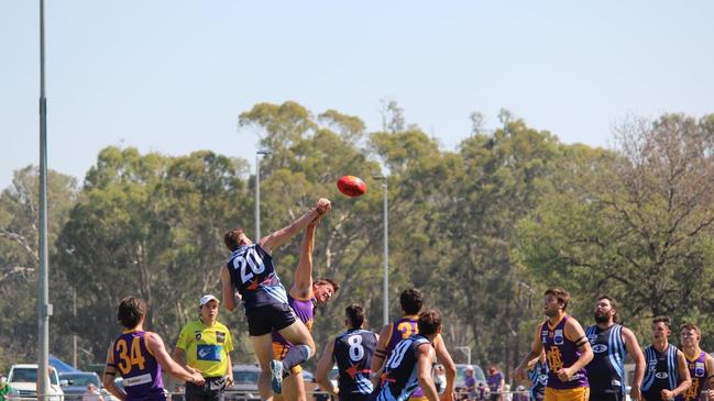 Tongala ruckman Jack Monigatti flies above his Nathalia opponent. Photo: TFNC