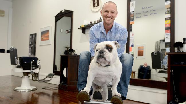 Lenny the bulldog from The Mens Room is quite a famous face down Hindley St. He goes to work with owner Adam Newman. Pic: Tricia Watkinson