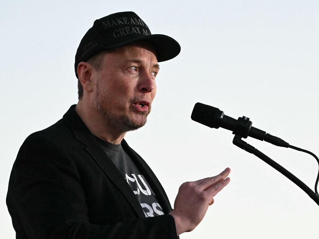 (FILES) Tesla CEO Elon Musk speaks on stage during a campaign rally with former US President and Republican presidential candidate Donald Trump at site of his first assassination attempt in Butler, Pennsylvania on October 5, 2024. Elon Musk, the tech billionaire closely allied with US President-elect Donald Trump, met Iran's ambassador to the United Nations in a bid to defuse tensions in the next administration, The New York Times reported November 14, 2024. (Photo by Jim WATSON / AFP)