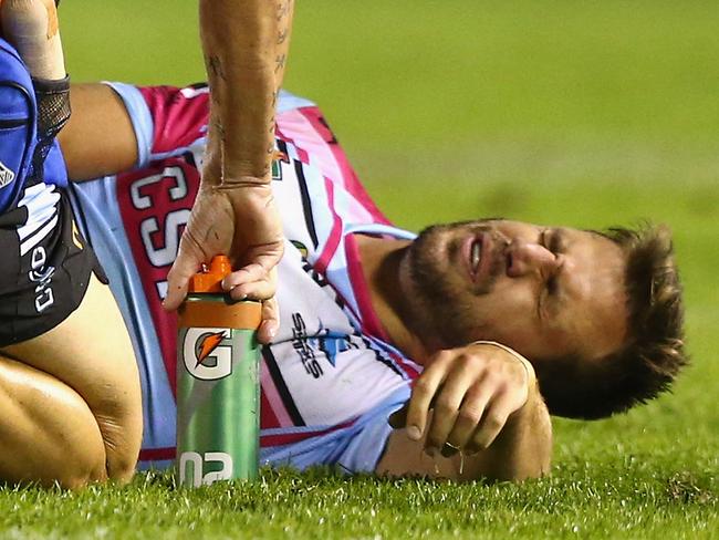 SYDNEY, AUSTRALIA - MAY 17: Beau Ryan of the Sharks injures his arm during the round 10 NRL match between the Cronulla-Sutherland Sharks and the Wests Tigers at Remondis Stadium on May 17, 2014 in Sydney, Australia. (Photo by Ryan Pierse/Getty Images)