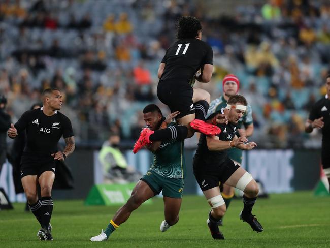 Filipo Daugunu of the Wallabies was given a yellow card for taking the legs of Caleb Clarke in the opening minutes of the match. Picture: Mark Metcalfe/Getty Images