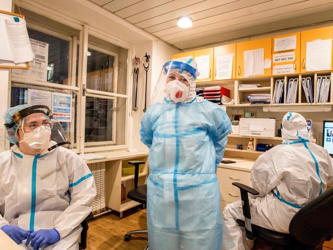 Tereza Zalesakova (right) is among the hundreds of medical students who have volunteered to help in Czech hospitals. Picture: Michal Cizek/AFP