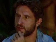 Host Jonathan LaPaglia ran the first post-merge tribal council.