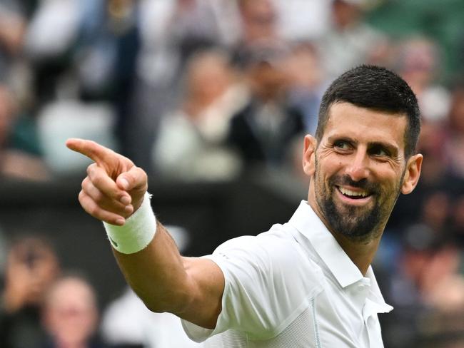 Serbia's Novak Djokovic celebrates winning against Czech Republic's Vit Kopriva during their men's singles tennis match on the second day of the 2024 Wimbledon Championships at The All England Lawn Tennis and Croquet Club in Wimbledon, southwest London, on July 2, 2024. (Photo by ANDREJ ISAKOVIC / AFP) / RESTRICTED TO EDITORIAL USE