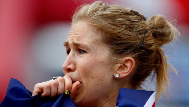 Jess Trengove reacts after finishing third in the women’s marathon at the Glasgow 2014 Commonwealth Games. Photo: Clive Rose/Getty Images