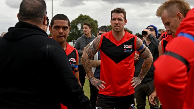 Dane Swan listens to the Western Rams backline coach. Picture: Andy Brownbill