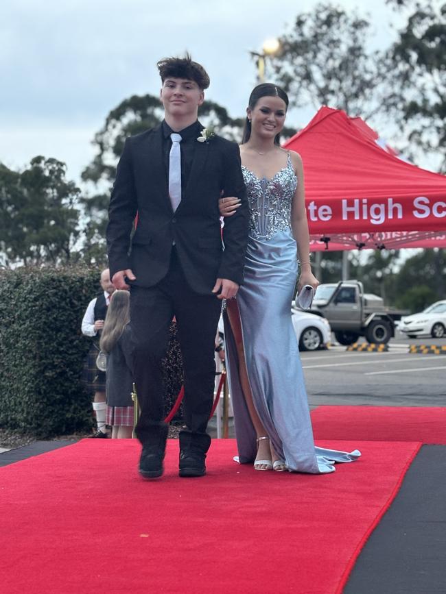 Students from Urangan State High School arrive at their formal.