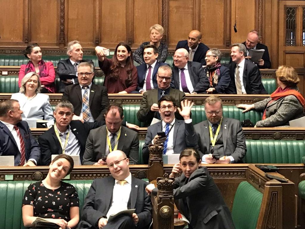 The seven Labour MPs sitting together as a group in the Commons.