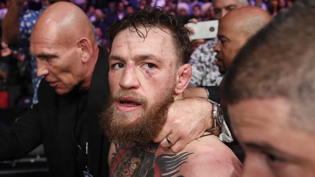 Conor McGregor walks out of the arena after he was defeated by Khabib Nurmagomedov 