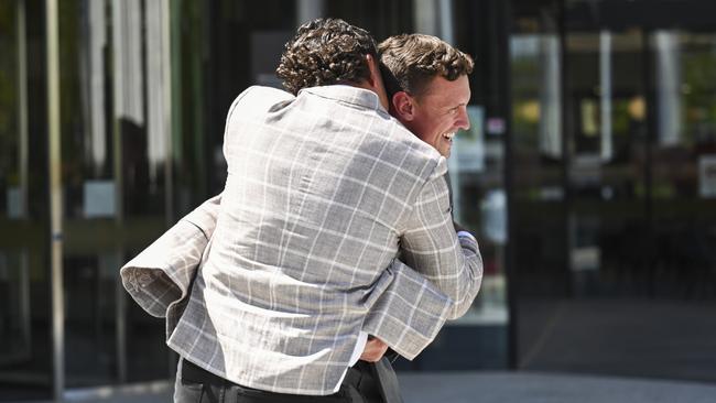 The pair embraced leaving court on Wednesday. Picture: NCA NewsWire / Martin Ollman