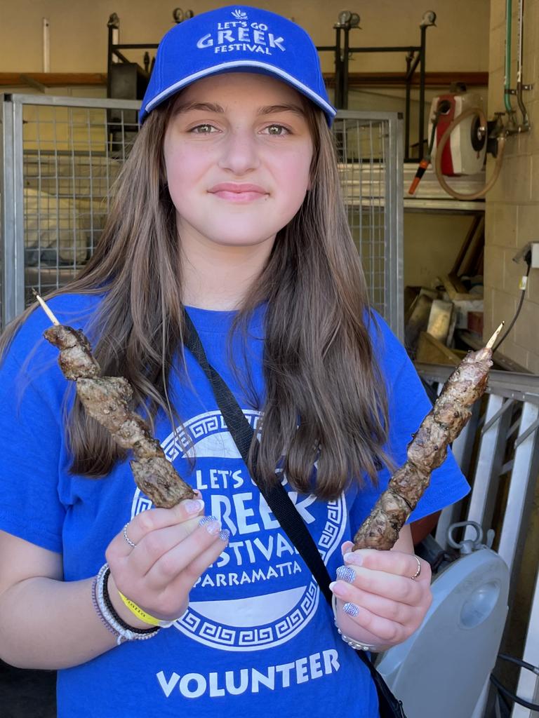 Anna Elafros, 14, with some delicious pork skewers.