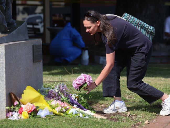 Flower are laid at the scene of the horror crash. Picture: Brendan Beckett