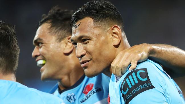 SYDNEY, AUSTRALIA - MARCH 23: Karmichael Hunt and Israel Folau of the Waratahs celebrate Folau scoring a try during the round six Super Rugby match between the Waratahs and the Crusaders on March 23, 2019 in Sydney, Australia. (Photo by Mark Kolbe/Getty Images)