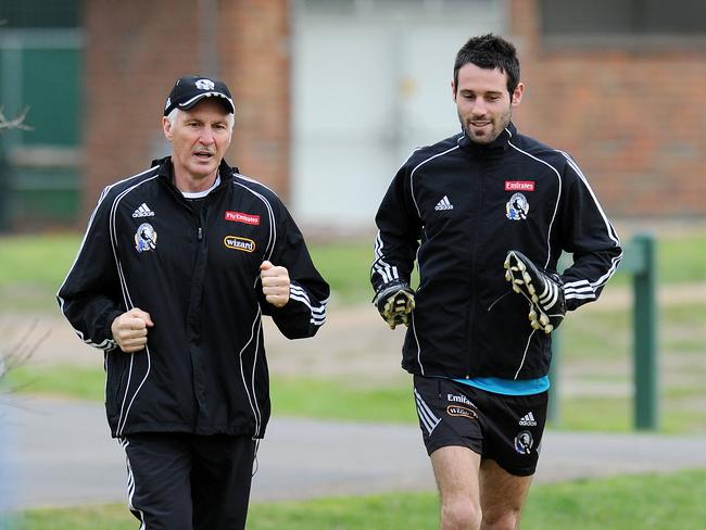 Malthouse and Didak run together at training.