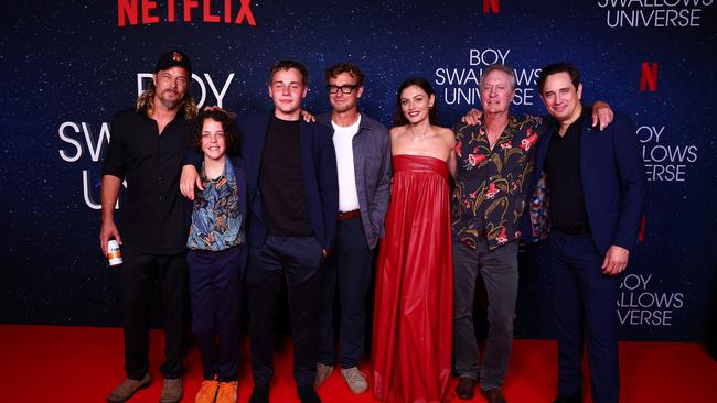 Travis Fimmel, Felix Cameron, Lee Tiger Halley, Simon Baker, Phoebe Tonkin, Bryan Brown and Trent Dalton attend the Netflix global premiere of Boy Swallows Universe at New Farm Cinemas on January 9. Photo by Chris Hyde/Getty Images for Netflix.