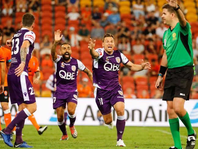 Diego Castro of the Glory and Brendon Santalab of the Glory plead to the referee for hand ball penalty during the Round 11 A-League match between the Brisbane Roar and the Perth Glory at Suncorp Stadium in Brisbane, Sunday, January 6, 2019. (AAP Image/Glenn Hunt) NO ARCHIVING, EDITORIAL USE ONLY
