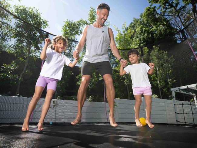 Sam Wood, pictured with his daughters, Willow, 6, and Charlie, 4, is encouraging Aussies to be more active. Picture: Tony Gough