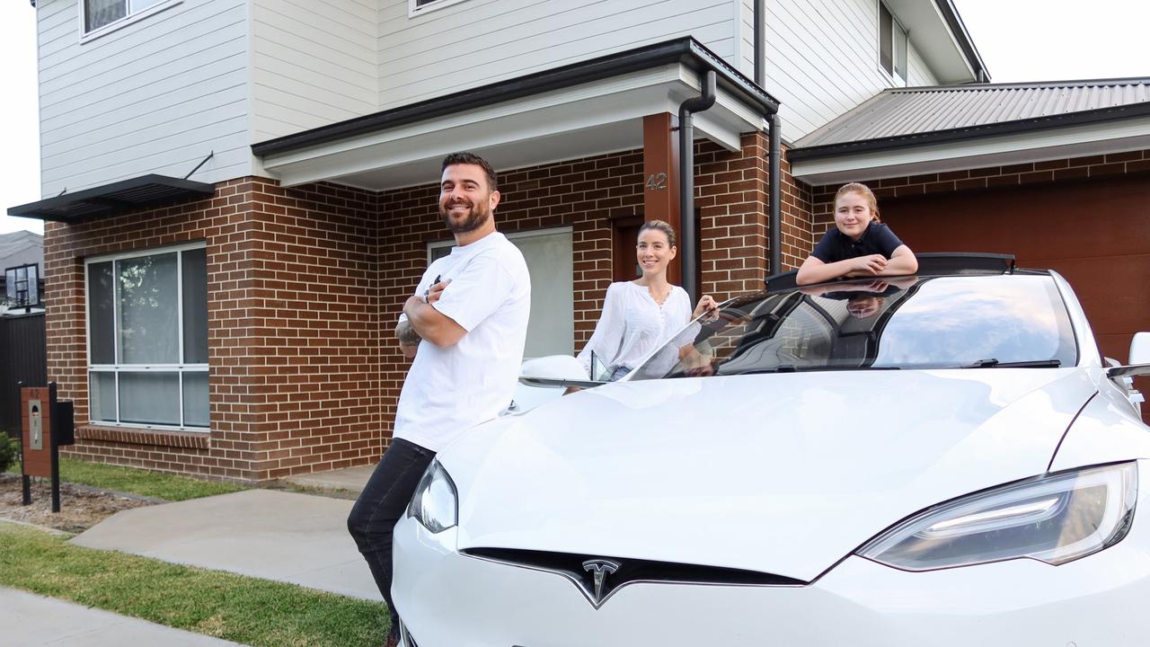 Tesla Model S owner Jerome O'Connor with daughter Maisy and partner Hannah.