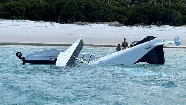 A Whitsunday Air Services plane crashed into waters off world-famous Whitehaven Beach with five people, a pilot and four passengers, on board. Picture supplied by Island FM Whitsundays