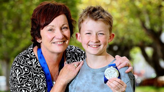 Two of the Pride of Australia Tasmania medal winners Lisa Jones of Kingston, left, and Campbell Remess, 12, of Acton. Pictures: SAM ROSEWARNE