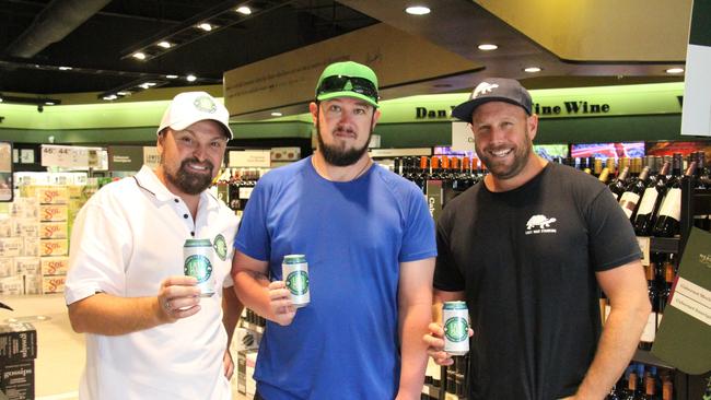 Steven Bradbury, Gladstone local Mike Ward and Stephen Prosser at the Gladstone launch of Last Man Standing larger at Dan Murphy's. Picture: Rodney Stevens