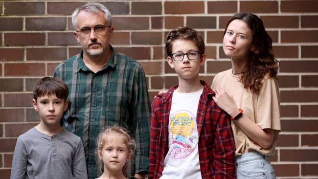 Kyrylo Prokopchuk, 9, pictured with his carers Olga Bablinyuk and Dmytro Bablinyuk — and their kids Egor Grydasov, 12, and Keira Bablinyuk, 6. Picture: Damian Shaw