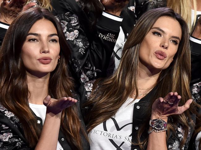 SHANGHAI, CHINA - NOVEMBER 18:  Victoria's Secret models Lily Aldridge, Alessandra Ambrosio and Jasmine Tookes pose during the All Model Appearance At Mercedes-Benz Arena  on November 18, 2017 in Shanghai, China.  (Photo by Frazer Harrison/Getty Images for Victoria's Secret)