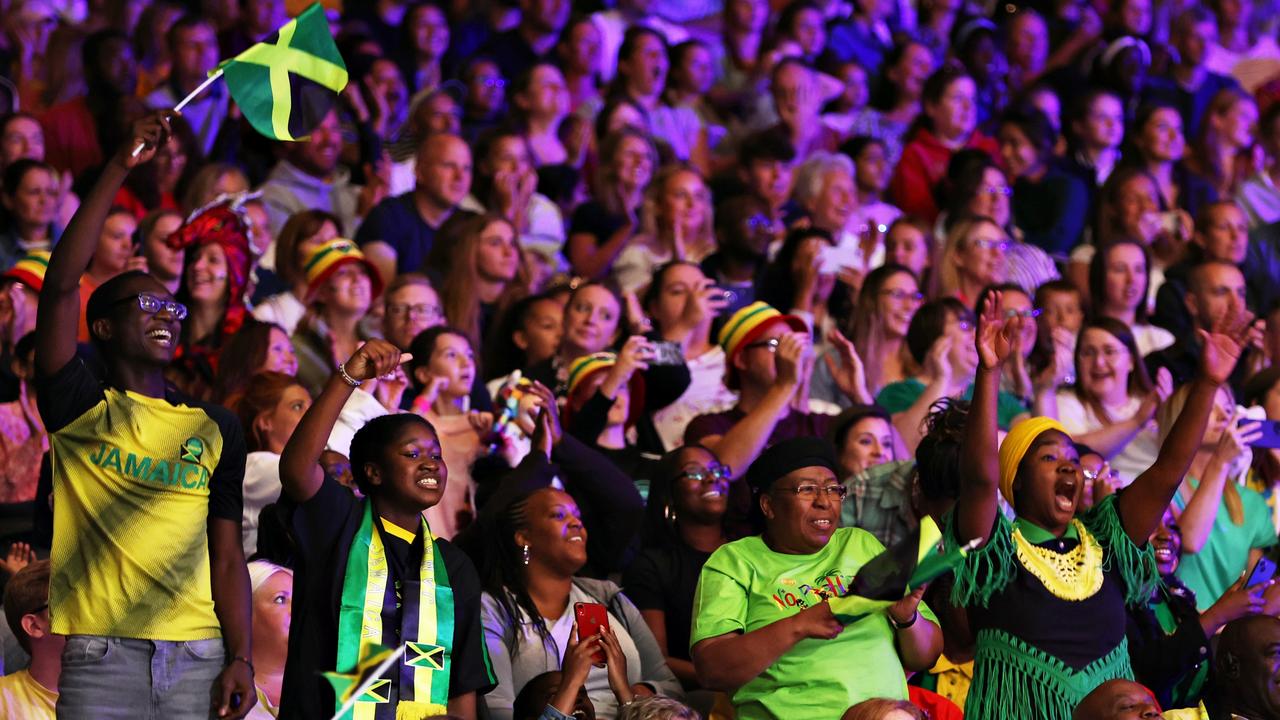Jamaican fans revel in their victory over Australia.