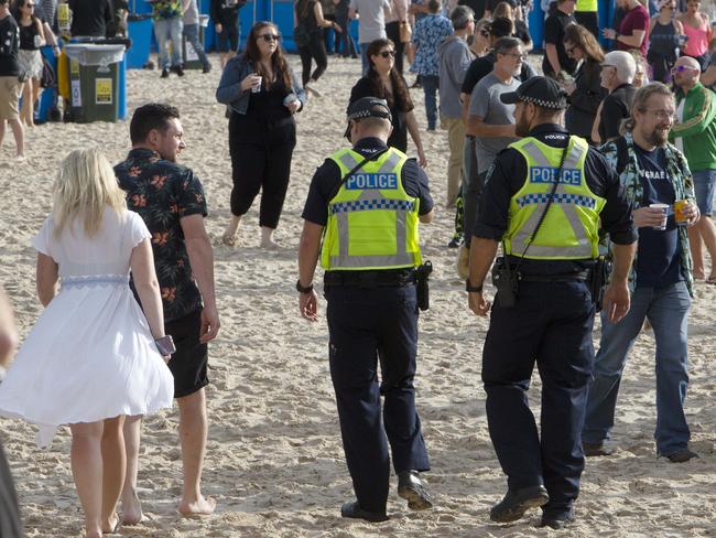 Police patrol the Fatboy Slim concert on Glenelg Beach. Adelaide, South Australia. The British dance music artist plays an outdoor concert AdelaideÕs Glenelg Beach, South Australia.Gates open 2.00pmDancespace 2.30pm - 3.15pmLL Cool Dre 3.30pm - 4.15pmLove Deluxe 4.30pm - 5.30pmIcarus 5.45pm - 6.45pm2Many DJs 7.00pm - 8.00pmFatboy Slim 8.30pm - 10.00pm(AAP/Emma Brasier)