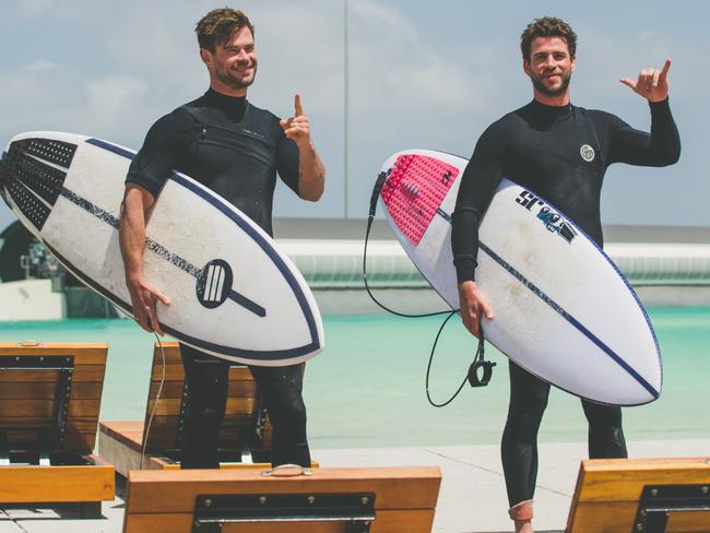 Chris and Liam Hemsworth at URBNSURF in Tullamarine. Picture: URBNSURF