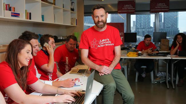 Labor assistant secretary Stephen Donnelly with “red shirt” volunteers.