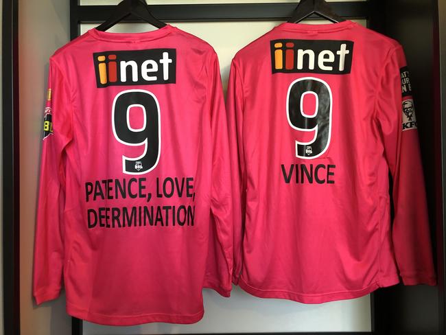 Sydney Sixers sport inspirational messages on their shirts.