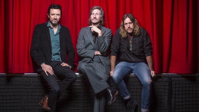 EMBARGO: HOLD FOR HIT. Contact Erinna Giblin 9292 1423 Tim Rogers, Kram and Paul Dempsey. Australian rock veterans, Paul Dempsey from Something for Kate, Tim Rogers from You am I and Kram from Spiderbait at the Corner Hotel in Richmond ahead of this years Day on the Green. Picture: Eugene Hyland