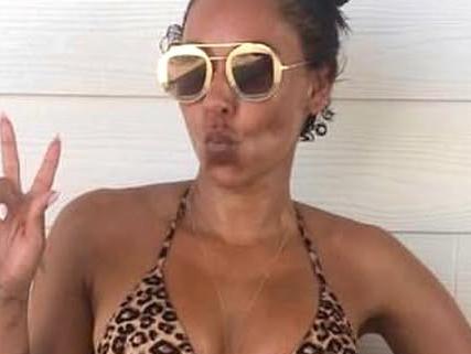 Melanie B poses in a bikini.