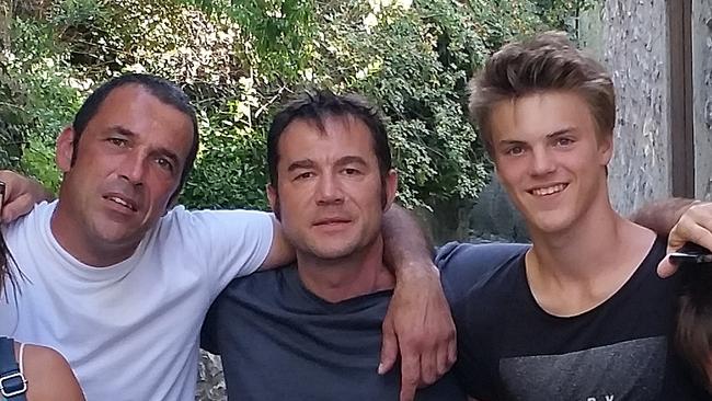 Pictured from left; Theo Hayez’s father Laurent, godfather Jean-Philippe Pector, and Theo. Supplied